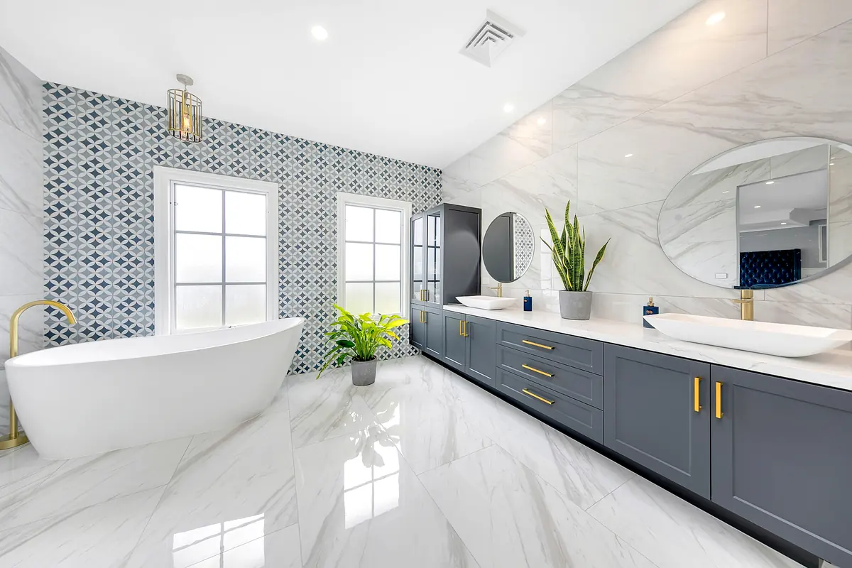 Marble ensuite with freestanding tub and gold tapware &mdash; real estate photography Melbourne
