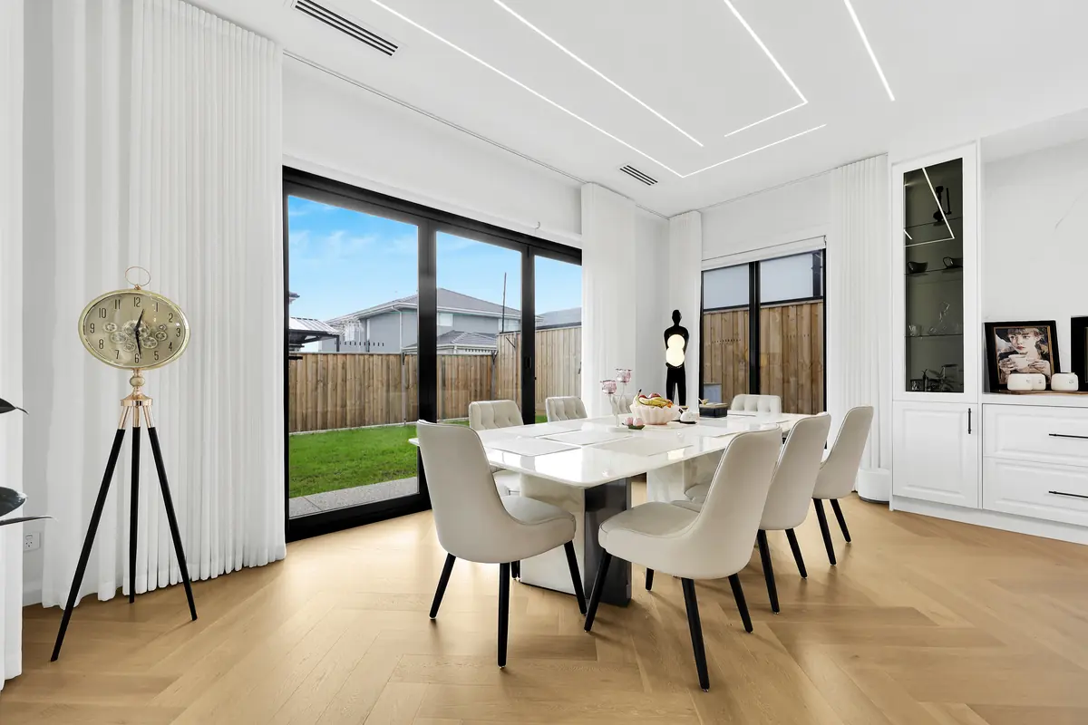 Elegant dining room with garden outlook &mdash; real estate photography Melbourne